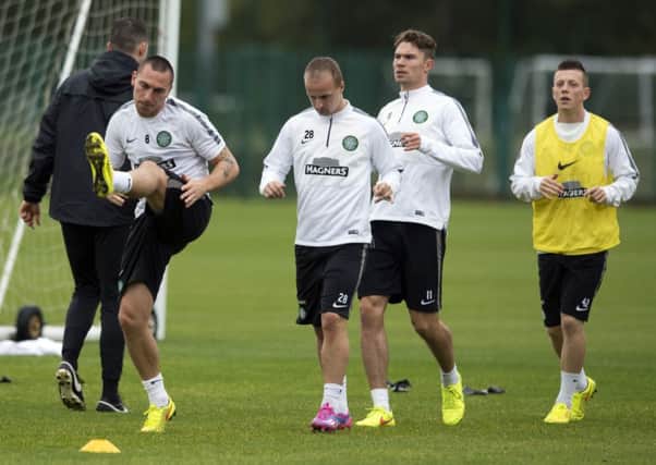 Celtic players, left to right, Scott Brown, Leigh Griffiths, Derk Boerrigter and Callum McGregor go through their routine during training at Lennoxtown yesterday in preparation for tomorrows Premiership match against Dundee at Dens Park. Picture: SNS