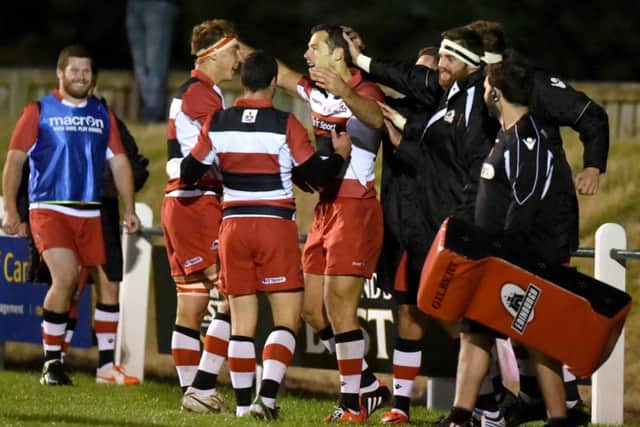 Tim Visser, third from left, celebrates his second try for Edinburgh during their pre-season friendly win over Newcastle. Picture: SNS Group/SRU