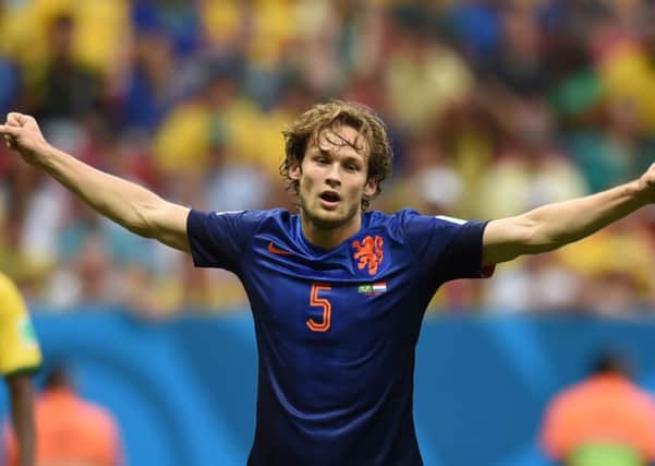 Daley Blind, playing here for Holland in the World Cup, has agreed to sign  for £13.8m  for Manchester United, where wasting money is no object.  Photograph: Getty Images