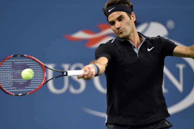 Roger Federer was able to cope with the big serve of Sam Groth. Photograph: Robert Deutsch/USA Today