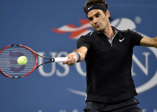 Roger Federer was able to cope with the big serve of Sam Groth. Photograph: Robert Deutsch/USA Today