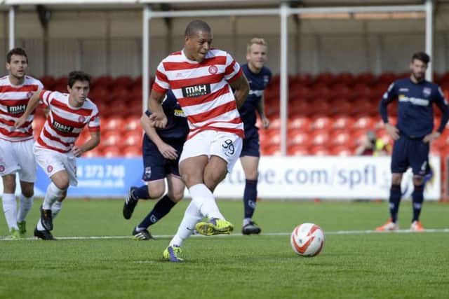 Hamilton's Mickael Antoine Curier scores his second penalty of the match. Picture: SNS