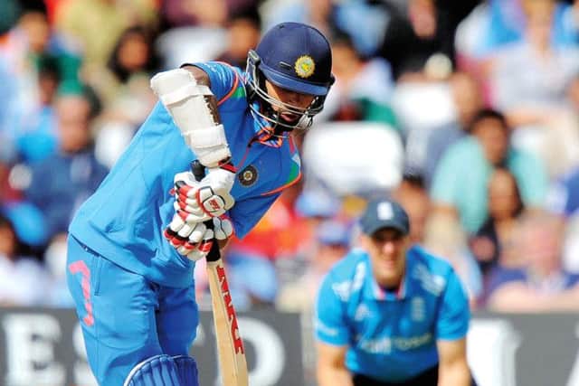 Indian opener Shikhar Dhawan helped his side to a fast start before falling to a catch by Eoin Morgan. Photograph: Olly Greenwood/AFP/Getty