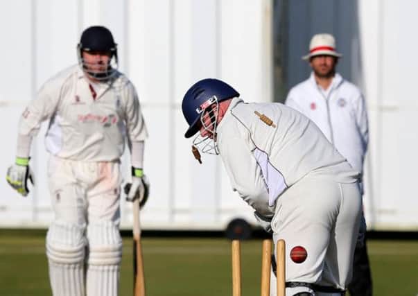 Scott McElnea bowls Stuart Corbett-Byres for the vital seventh wicket which won the championship for Ayr. Photograph: Robert Perry