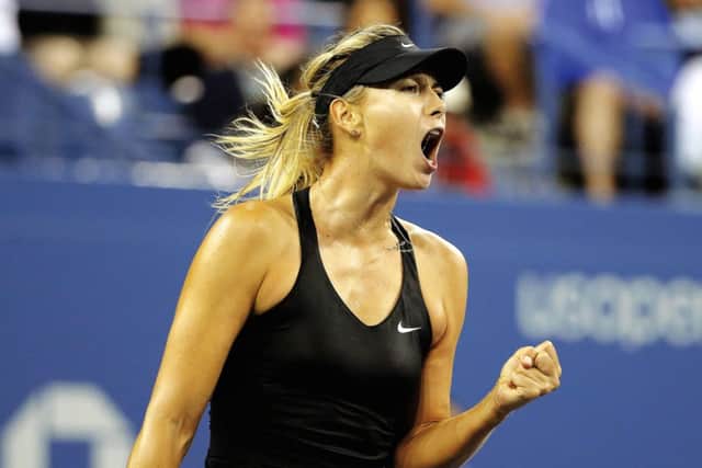 Maria Sharapova, of Russia, reacts after winning a game against Sabine Lisicki. Picture: AP