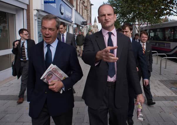 Ukip leader Nigel Farage accompanies former Tory MP for Clacton, Douglas Carswell. Picture: PA