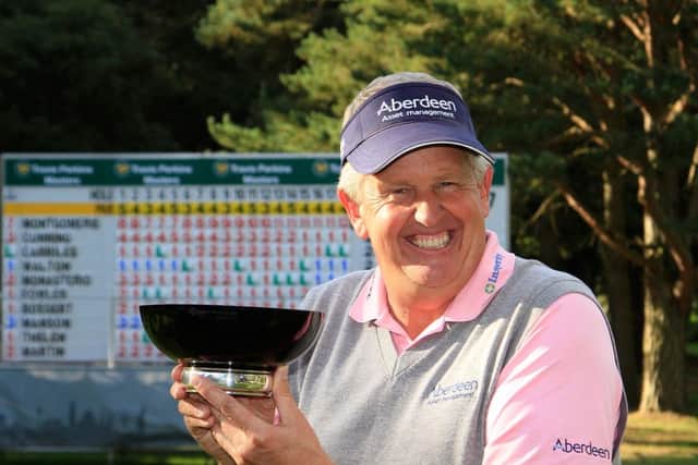 Colin Montgomerie with the trophy after successfully defending his Travis Perkins Masters title. Picture: Getty