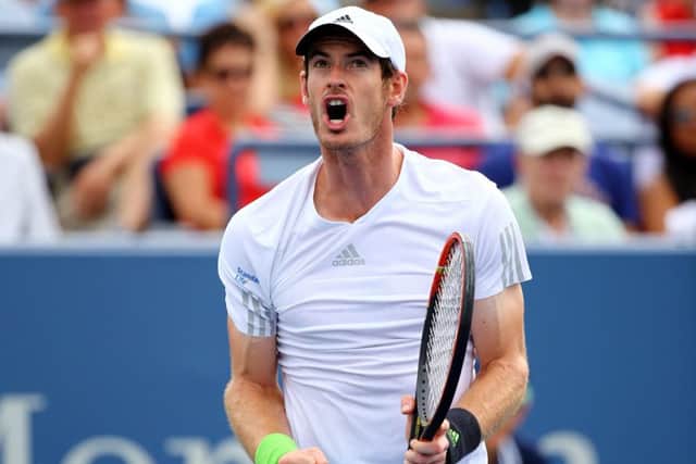 Andy Murray celebrates after winning the second set in his third-round match against Andrey Kuznetsov. Picture: Getty