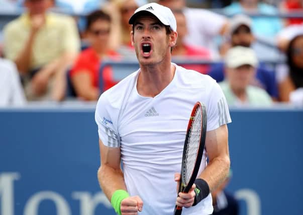 Andy Murray celebrates after winning the second set in his third-round match against Andrey Kuznetsov. Picture: Getty