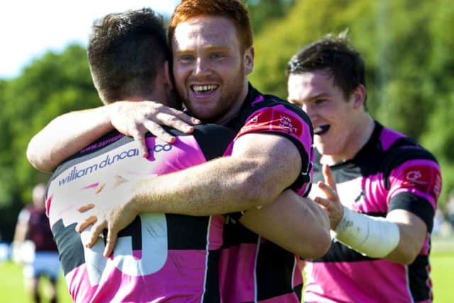 Ayr's Grant Anderson (left) amd Murray McConnell celebrate their win. Picture: Gary Hutchison