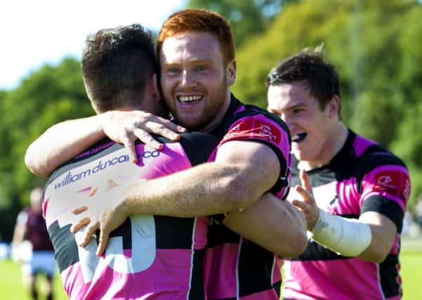 Ayr's Grant Anderson (left) amd Murray McConnell celebrate their win. Picture: Gary Hutchison