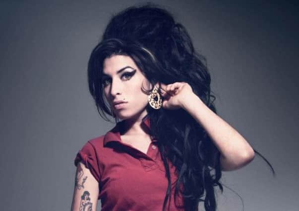 Amy Winehouse joked that, like her husband Blake Fielder-Civil, Nelson Mandela had spent a long time in prison. Picture: PA