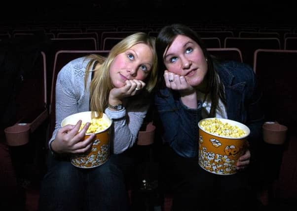 Films that don't hold your attention or bore you make you more likely to pay attention to how much you eat. Picture: Kenny Smith