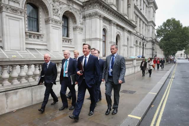 David Cameron walks to Parliament from Downing Street on Monday. Picture: Getty Images