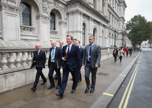 David Cameron walks to Parliament from Downing Street on Monday. Picture: Getty Images