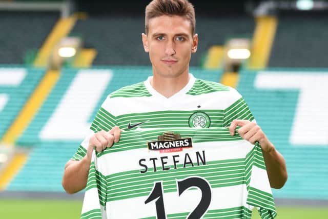 Stefan Scepovic shows off his number twelve shirt as he is unveiled as a Celtic player. Picture: SNS