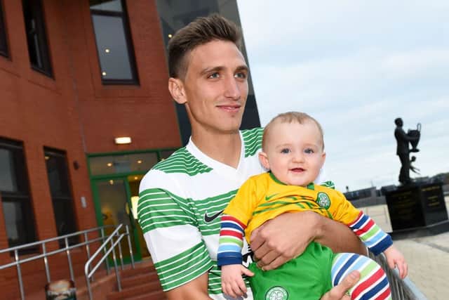 All smiles from new Celtic striker Stefan Scepovic as he meets fans outside Celtic Park. Picture: SNS