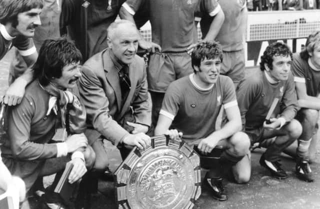 Bill Shankly with, front from left, Tommy Smith, Emlyn Hughes and Ian Callaghan in 1974. Picture: Getty