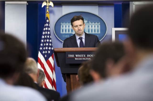 White House press secretary Josh Earnest breaks the news. Picture: AP