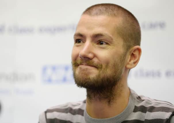 British Ebola sufferer William Pooley looks happy and healthy during a press conference, where he thanked staff at the hospital. Picture: PA