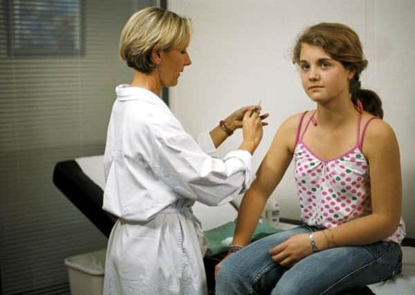 A young girl receives the HPV vaccine. Picture: Sanofi Pasteur MSD/PA