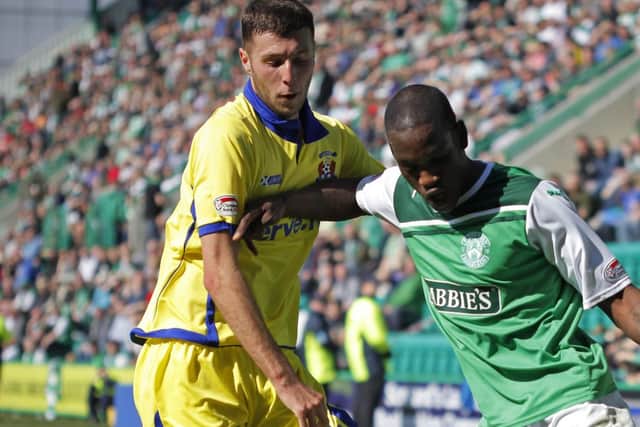Lewis Toshney, left, playing for Kilmarnock against Hibs in 2012. Picture: TSPL
