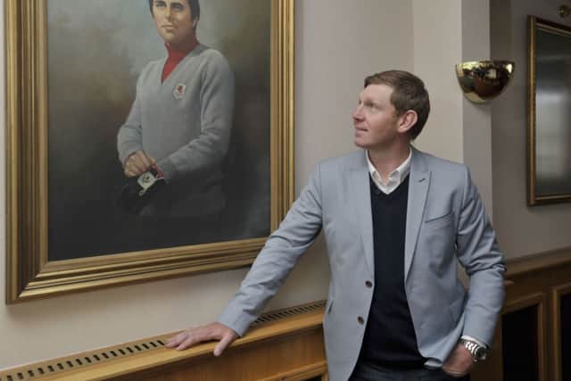 Stephen Gallacher looks at a painting of his uncle, Bernard Gallacher, in the Bathgate clubhouse. Picture: Ian Rutherford
