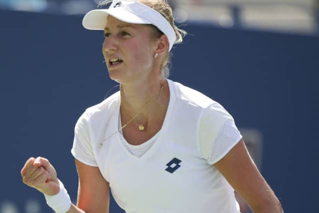 Ekaterina Makarova reacts after winning a point against Victoria Azarenka. Picture: AP