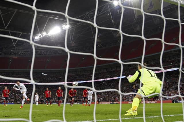 Wayne Rooney rifles the ball past Norway goalkeeper Orjan Haskjold Nyland. Picture: Reuters