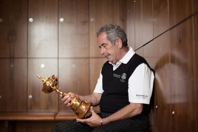 Sam Torrance poses with the Ryder Cup in the locker room at Gleneagles. Picture: Tom Shaw