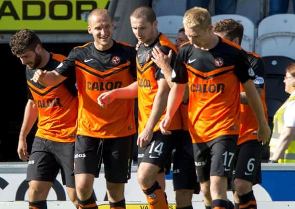 The boys were impressed with 
Dundee United's signings particularly Jaroslaw Fojut (2nd from right). Picture: SNS