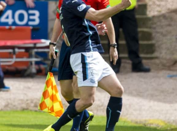 James McPake celebrates scoring for Dundee. Picture: SNS
