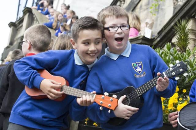 Schoolchildren are choosing the instrument, inspired by stars such as Taylor Swift.  Picture: Getty Images