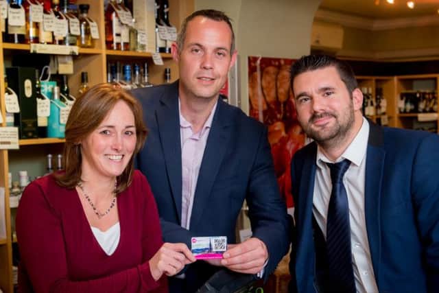 Diane Brown, Colin Munro and Stuart Oliver (right) of Provender Brown, which is one of the retailers pioneering the programme. Picture: Fraser Band