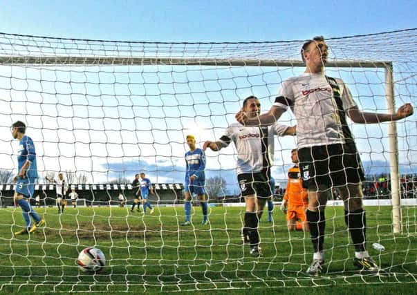 Kevin Kyle celebrates after scoring a goal for Ayr Pictures: The Honest Men by Gerry Ferrara.