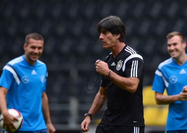 Germany's national football team coach Joachim Loew watches his players train. Picture: Getty