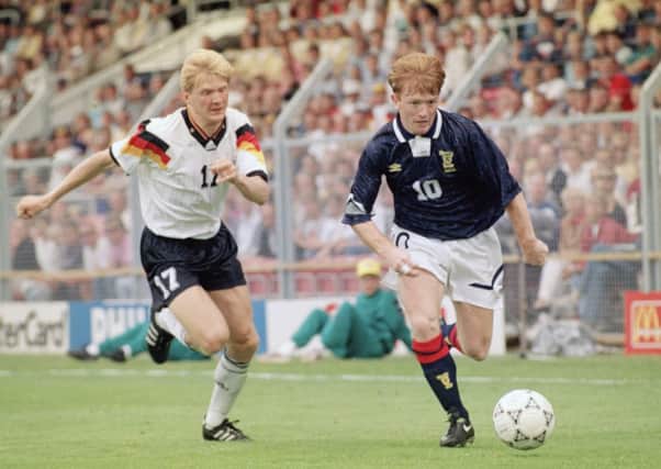 Stefan Effenberg, who scored in Germanys 2-0 win, arrogantly challenges Scotland midfielder Stuart McCall at the Euro 92 finals in Sweden. Picture: Getty