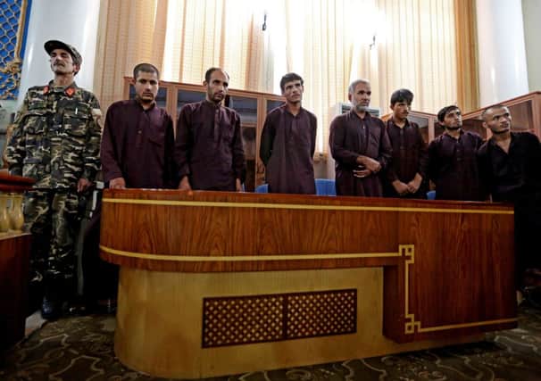 The seven defendants were found guilty of rape, robbery and assault by an Afghanistan court. Picture: AP