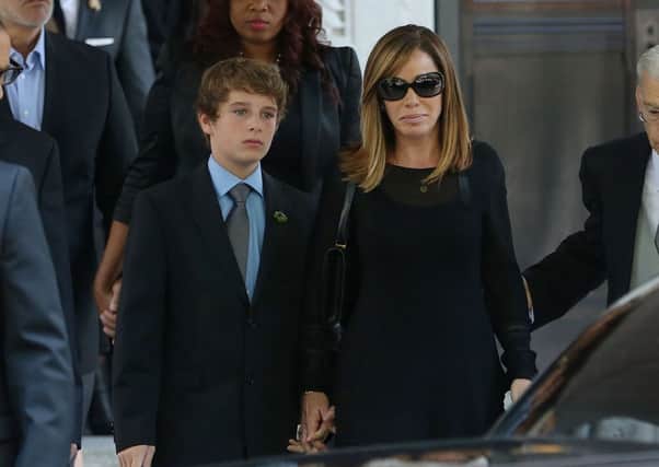 Cooper Endicott and Melissa Rivers depart the Joan Rivers memorial service in New York City. Picture: Getty