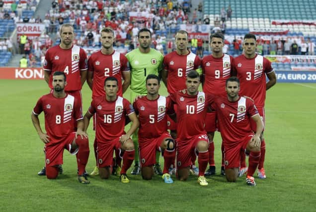 Gibraltar line up for their first ever competitive clash. Picture: AP