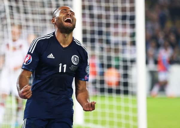 Ikechi Anya celebrates after his equaliser gave Scotland brief hope of a positive result. Picture: Getty