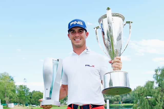 Billy Horschel with the BMW trophy (L) and J.K. Wadley trophy (R) after his victory. Picture: Getty