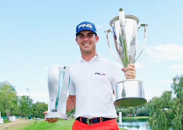 Billy Horschel with the BMW trophy (L) and J.K. Wadley trophy (R) after his victory. Picture: Getty