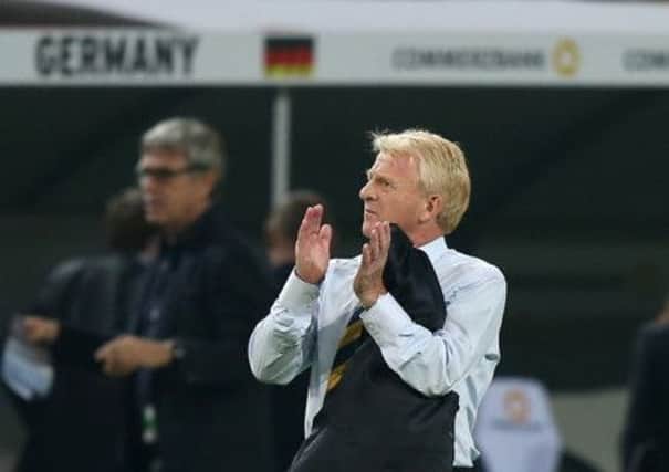Scotland's manager Gordon Strachan applauds the Scotland fans at the end of the match against Germany in Dortmund. Picture: PA