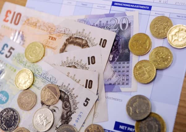 A survey by the TUC showed that of the one in three who say their employer does not pay the living wage to all staff, 79% believed they could afford to pay it. Picture: PA