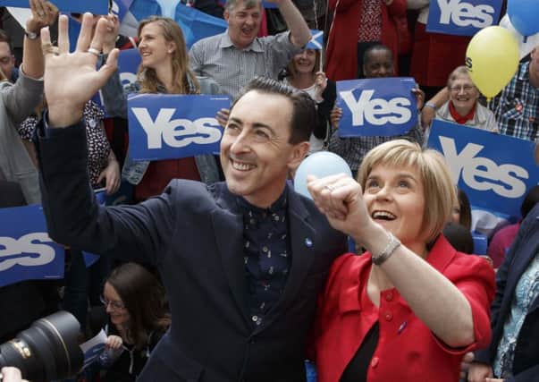 Alan Cumming and Nicola Sturgeon at a meeting outside the Yes Scotland office in Glasgow. Picture: Robert Perry
