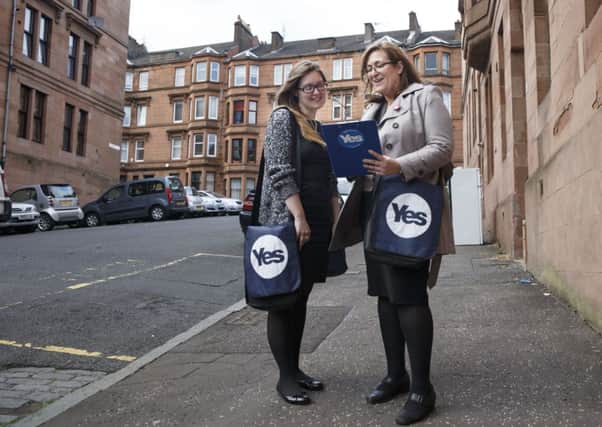 Sophie Macdonald, left, and Eva Bolander out and about in Partick as they canvas for Yes Scotland. Picture: Robert Perry