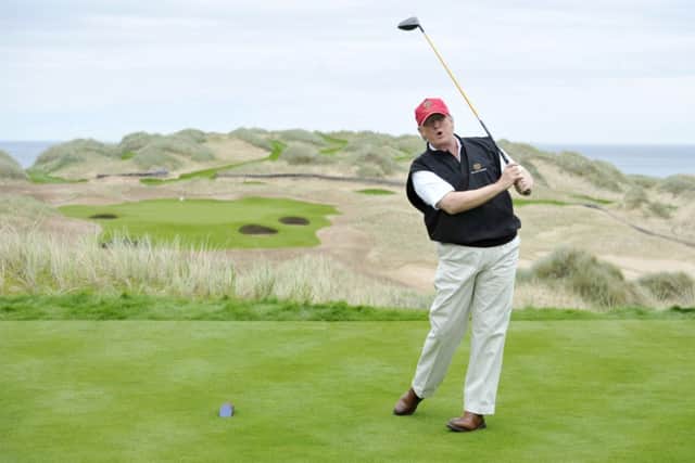 Donald Trump poses for the press on the thirteenth tee of his golf course on the Menie Estate, Balmedie, Aberdeenshire in 2011. Picture: Dan Phillips
