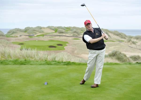 Donald Trump poses for the press on the thirteenth tee of his golf course on the Menie Estate, Balmedie, Aberdeenshire in 2011. Picture: Dan Phillips