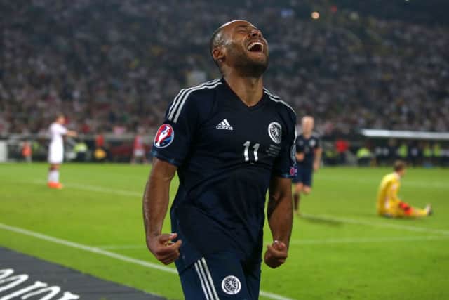 Scotland's Ikechi Anya celebrates scoring against Germany, the winger has emerged as a target for Celtic. Picture: PA
